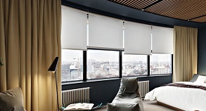 motorized roller shades in a contemporary Manhattan bedroom