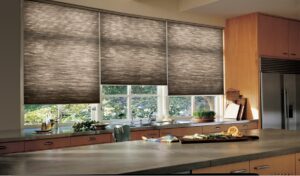 Motorized cellular shades in a kitchen