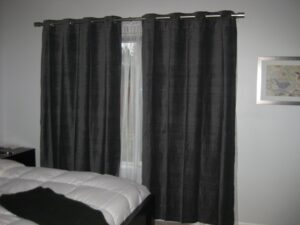 Blackout curtains in a bedroom